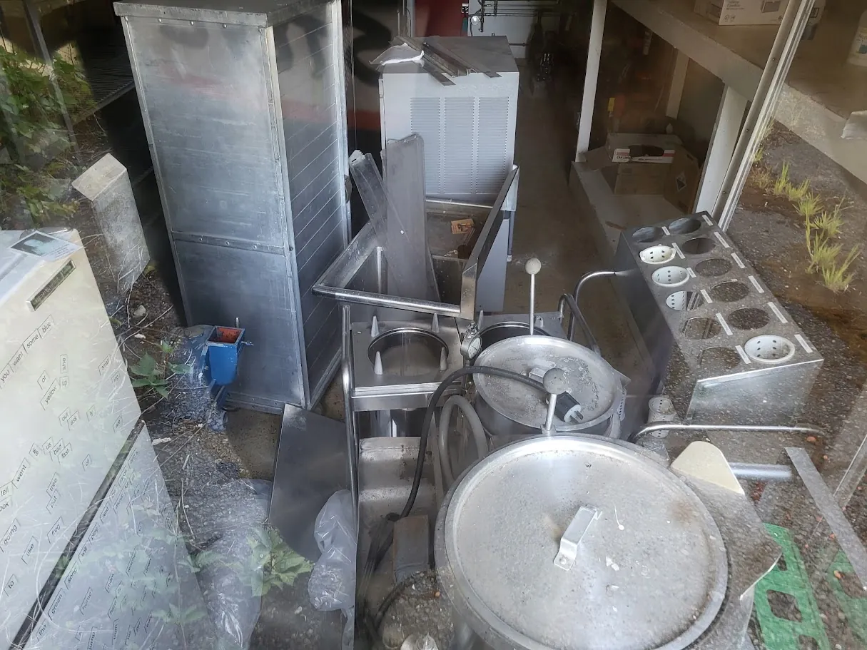 Existing commercial kitchen equipment stored at the campus