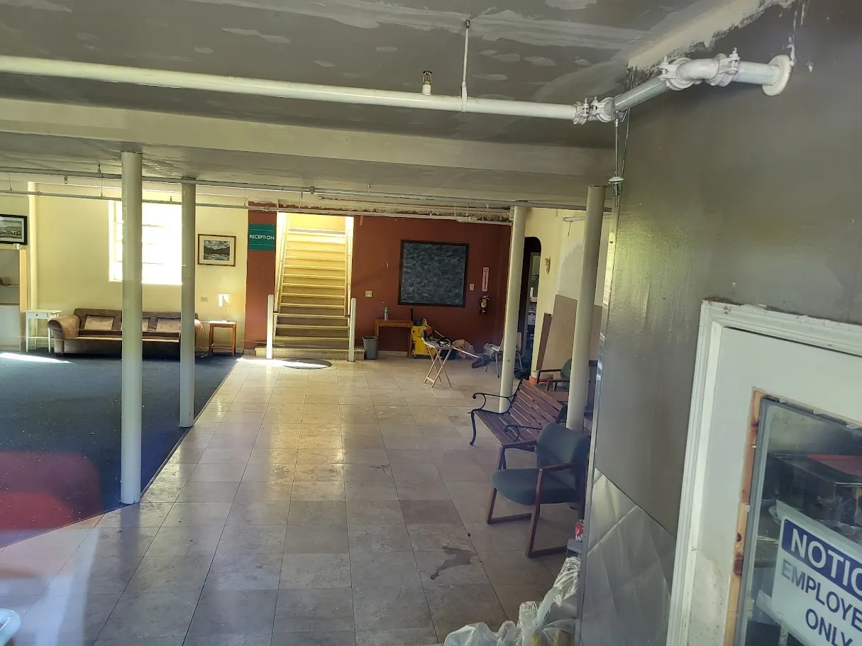 Current reception and stair area inside the campus