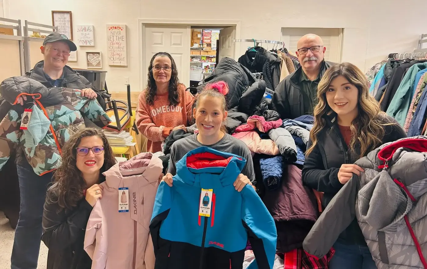 GG's House volunteers with coats collected for the community