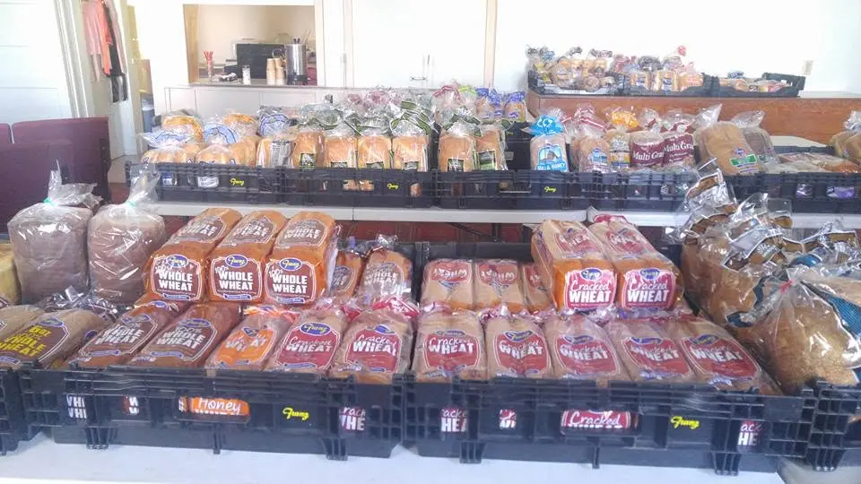 Bread organized in crates for community distribution