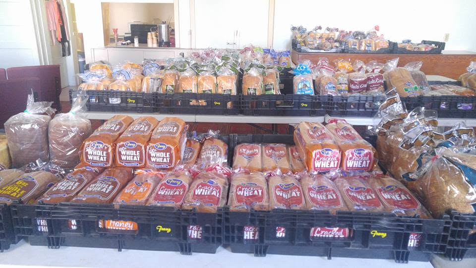 Bread organized in crates for community distribution