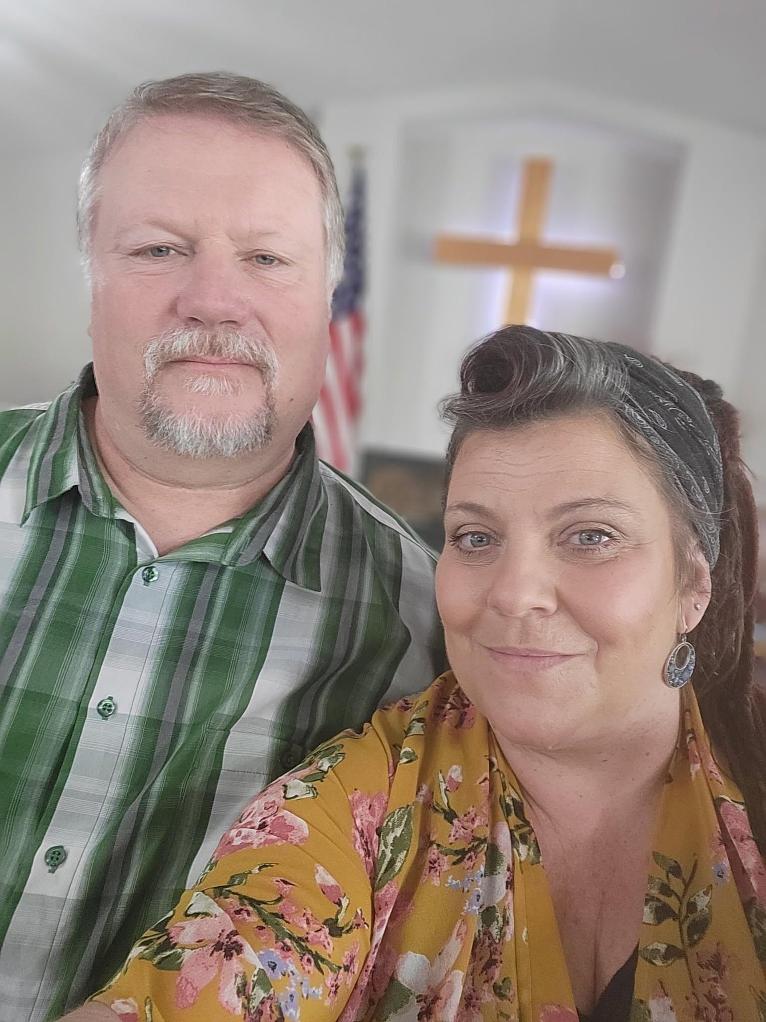 Steve and Angel standing together outside their church