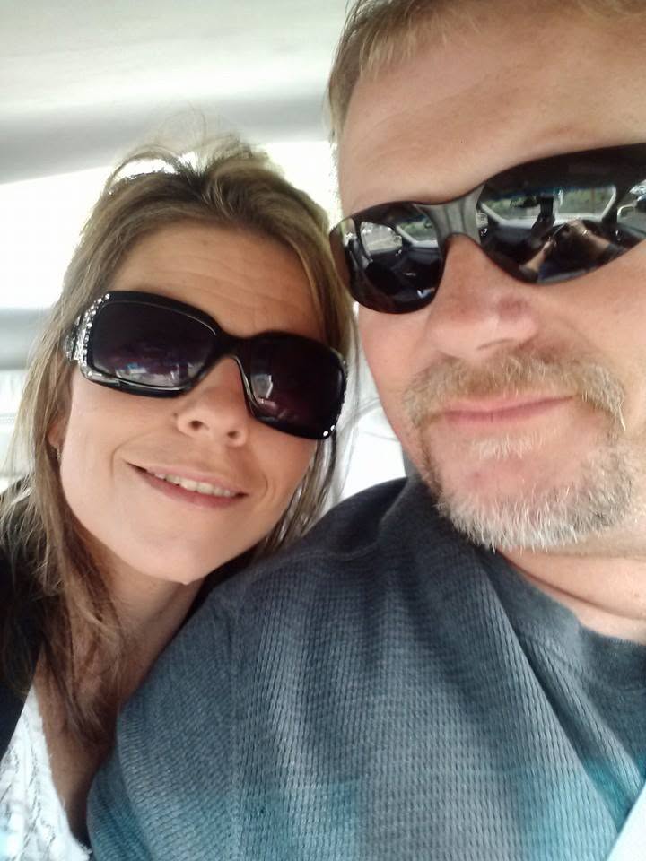 Steve and Angel smiling together for a casual selfie